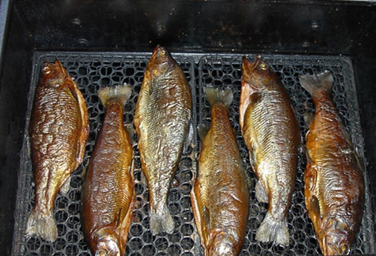 Peixes inteiros, grelhados à moda basca.